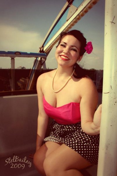 Female model photo shoot of Ashley McKibben in Ferris Wheel, Top of a