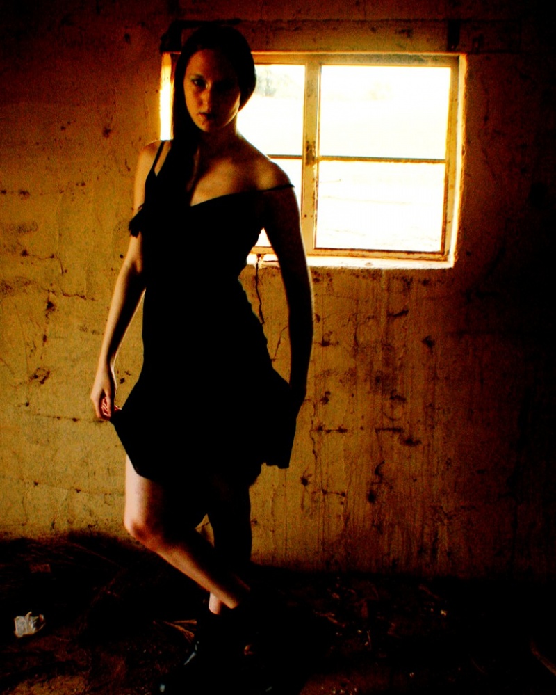 Female model photo shoot of lopsided heart by ramone2323 in abandoned house