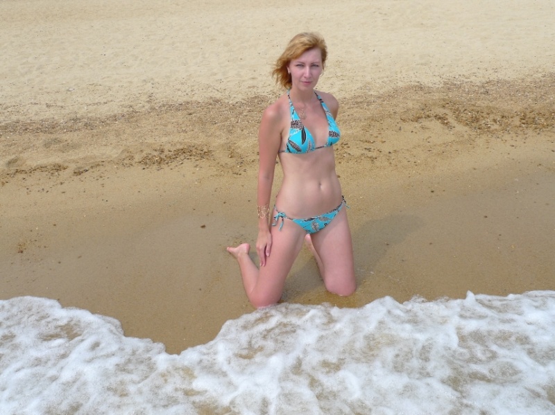 Female model photo shoot of Natalia CA in beach theme