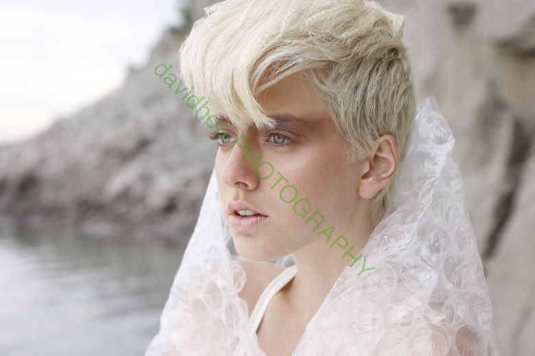 Female model photo shoot of HairsprayandGloss
