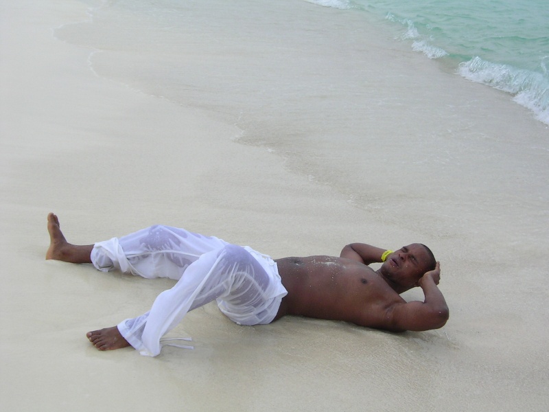 Male model photo shoot of Aston Walters in Anguilla. Shoal Bay Beach