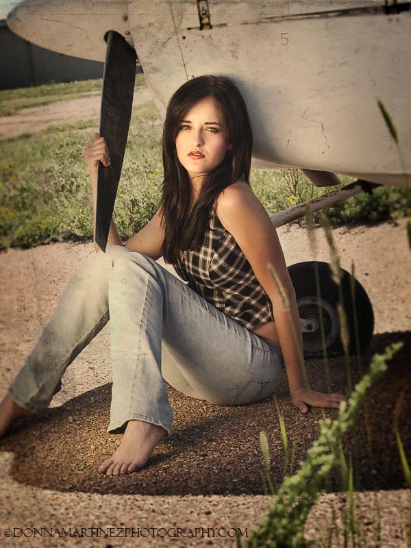 Female model photo shoot of Jessica Marie by Donna Martinez  in Airfield in Falcon