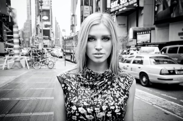 Female model photo shoot of Madeleine Armstrong in Times Square, New York