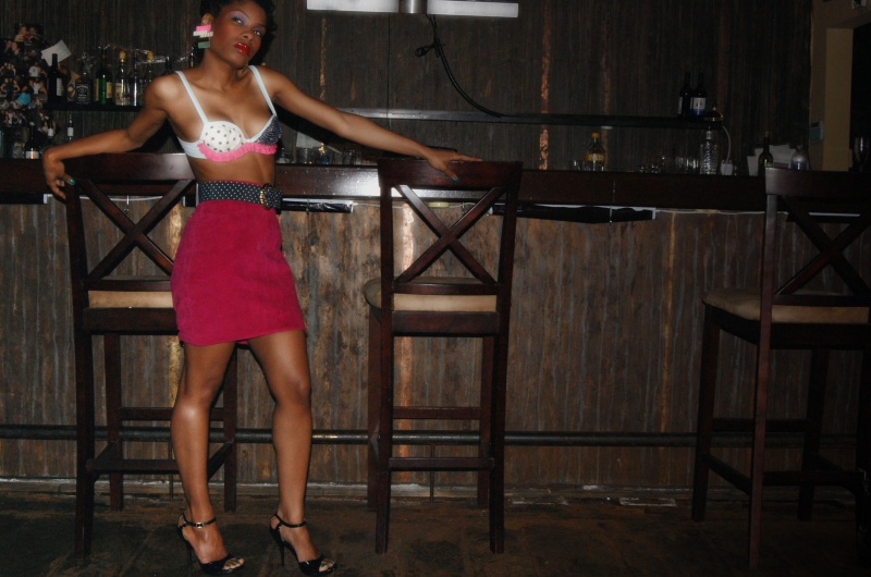 Female model photo shoot of shi shi ector by Kristin Howse in Par Lounge- Chicago, clothing designed by Meena Osei-Kuffour