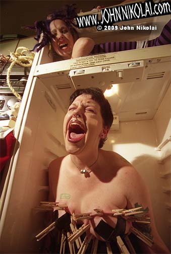 Female model photo shoot of Lil miss Fidget and _Nickie_ by John G Nikolai in in a fridge lol 