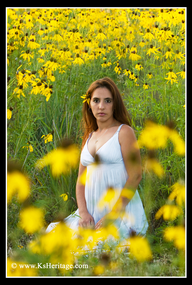 Male and Female model photo shoot of KsHeritage and Saleen Patterson by KsHeritage in West of Auburn, Kansas in a field of wildflowers on property owned by RAVENWOOD LODGE:  http://www.ravenwoodoutdoors.com/