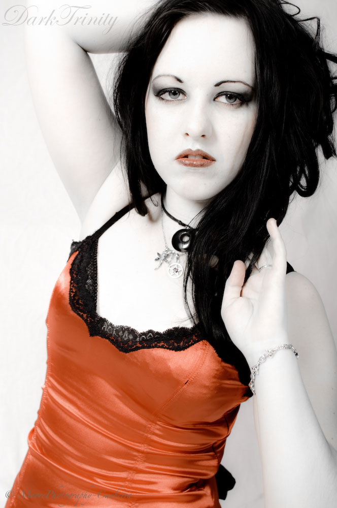 Female model photo shoot of DarkTrinity by MoorePhotography in Studio