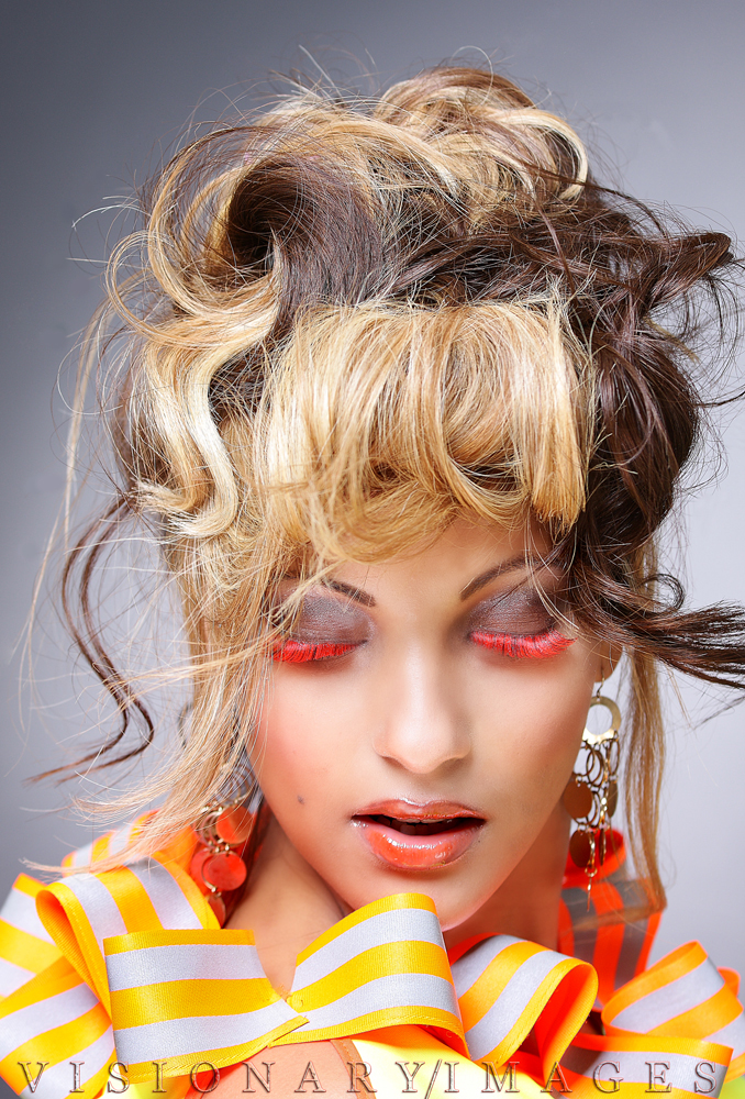 Female model photo shoot of Desirai Tolbert by CFVickFotografia, makeup by Desirai Tolbert, clothing designed by Brehon Williams