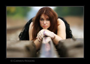 Female model photo shoot of Bethani Sadler in old railroad