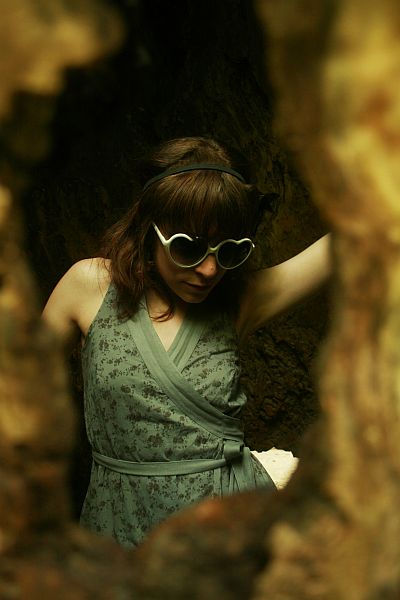 Female model photo shoot of The Violet Noir and Claudia B in inside a tree