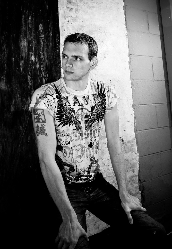 Male model photo shoot of Tristan Alastair by David Welker in Downtown Springfield, Mo