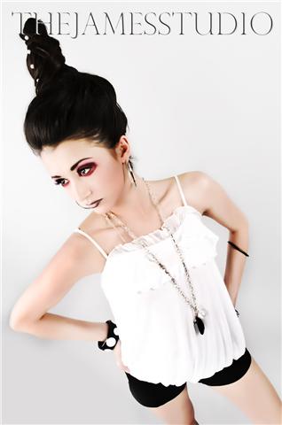 Female model photo shoot of Courtni Vecchiarelli, hair styled by Tanya Owens