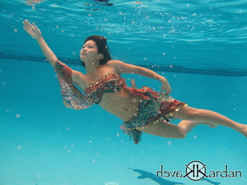 Female model photo shoot of Sande N by Kardan Photography in Pool