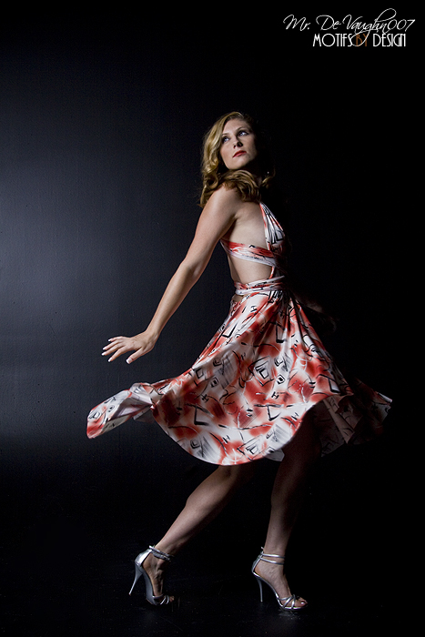 Female model photo shoot of Emma Shew by Motifs By Design, makeup by Ivy LaArtista, clothing designed by marian collier