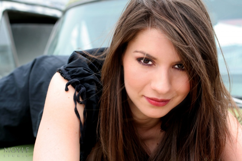 Female model photo shoot of Elynor Martinez in At a Car Junk, Salt Lake City, UT
