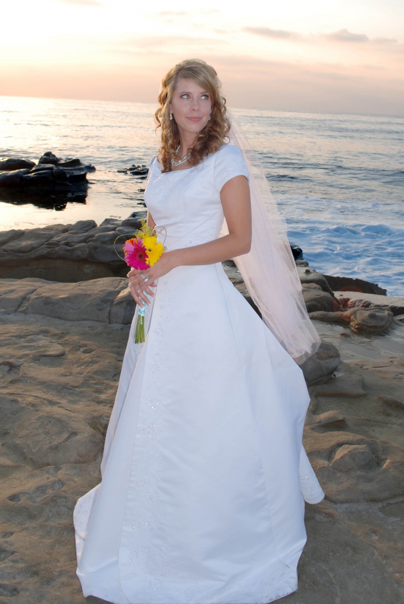 Female model photo shoot of JMLphotography in La Jolla Beach