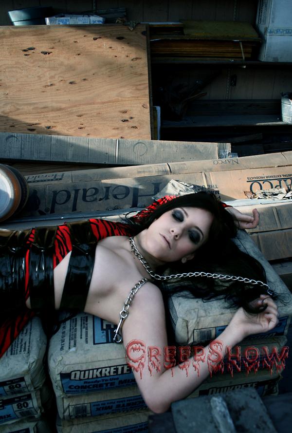 Female model photo shoot of Sibyl Vain Clothing and Minxzilla by Creep Show in We'll never tell