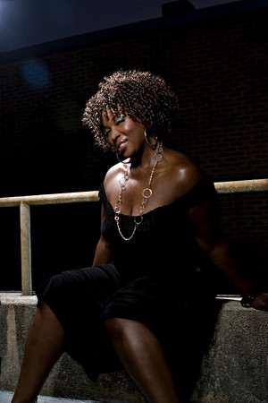 Female model photo shoot of Monique Yvette in Downtown Raleigh, makeup by Libra Looks 