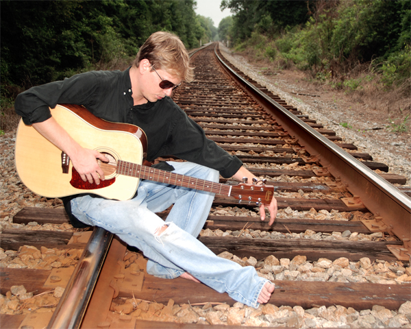 Male model photo shoot of actorarthur in Riverbanks railroad tracks