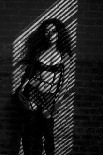 Female model photo shoot of Nicole Castillo in Downtown Studio