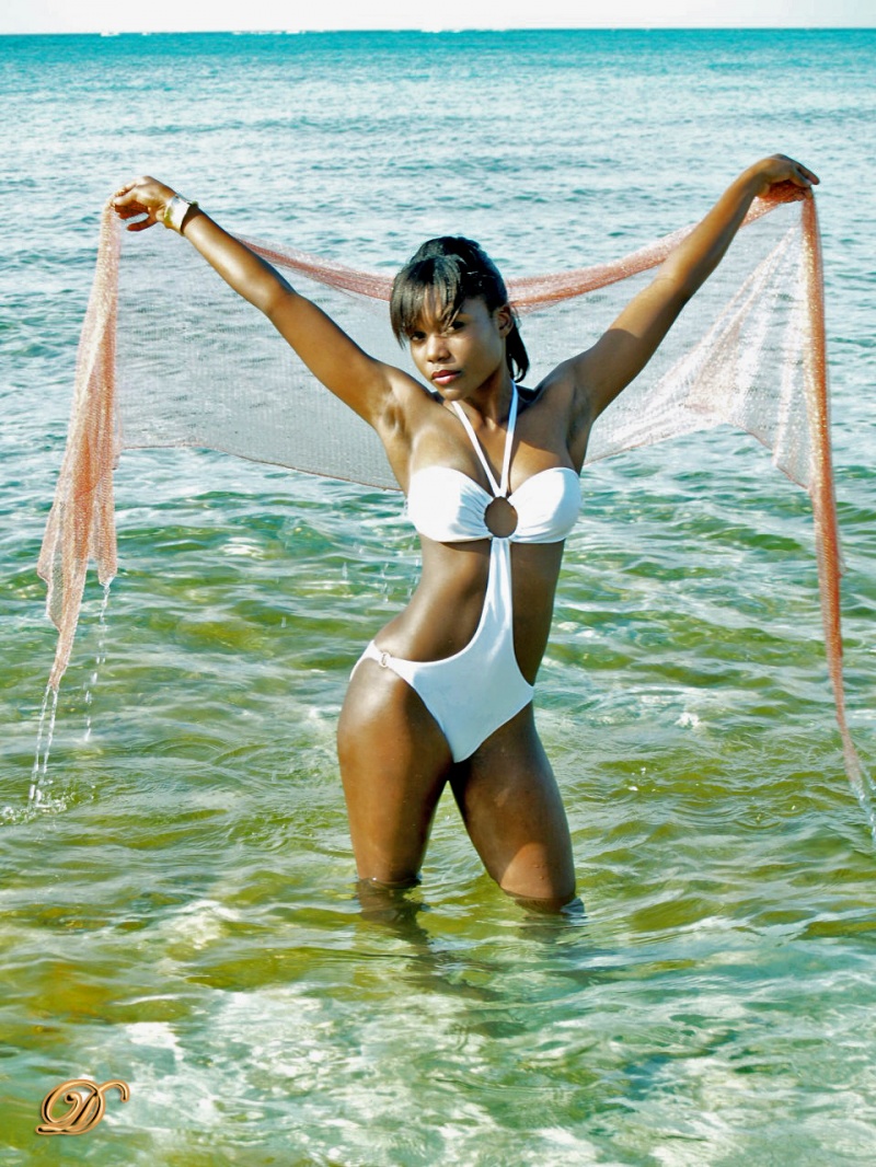 Female model photo shoot of Nik H by Darcy Darville in Orange Hill. Nassau, Bahamas, clothing designed by Nicki J Swimwear