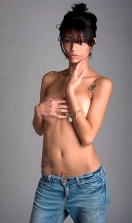 Female model photo shoot of Aziza Original in studio wrk.