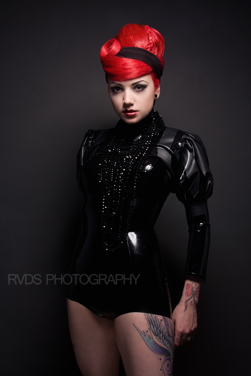 Female model photo shoot of Jane Doe Latex by RVDS, hair styled by Ceri Cushen