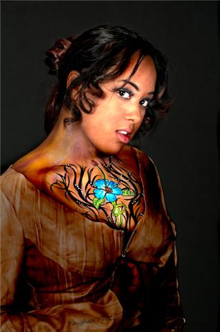 Female model photo shoot of PartyTime Facepainting in Toronto