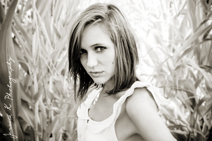 Female model photo shoot of Jessica K Photography in Corn Field