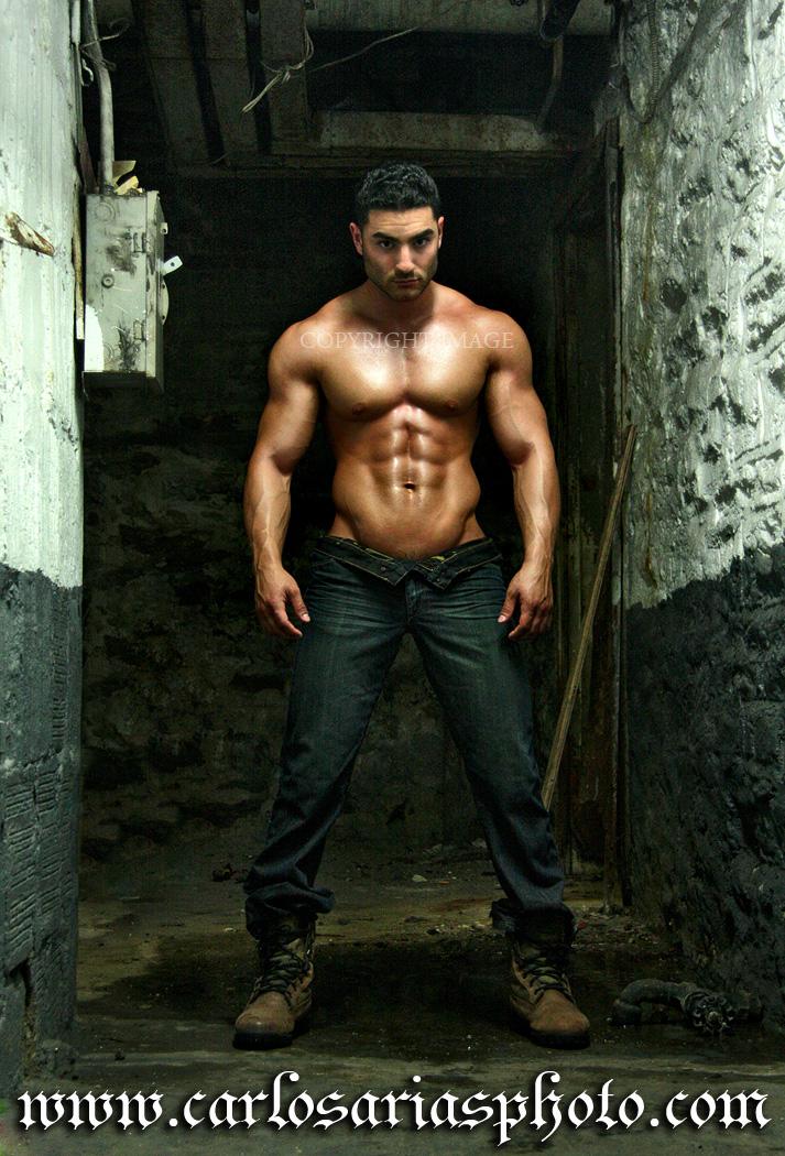 Male model photo shoot of Benny Biceps by Carlos Arias NYC in Harlem appt. building basement