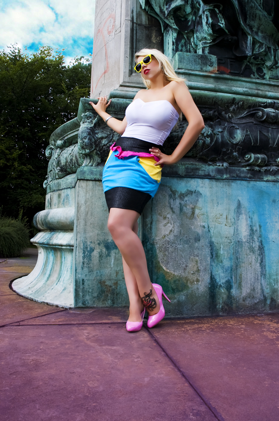 Female model photo shoot of Rach Doll by Nadia King in Hyde Park, Leeds, clothing designed by Panda Loves Kitsch