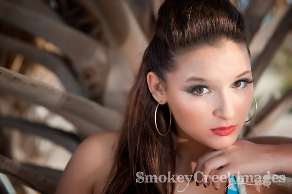 Female model photo shoot of Brittany Binder by SmokeyCreekImages in Galveston, makeup by Pink Ink MUA