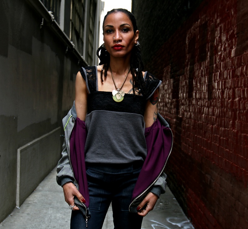 Female model photo shoot of AriReneeDesigns in Alley between 1st Street and Mission St San Francisco