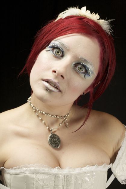 Female model photo shoot of Makeup by Doll and May-Z by Mark Boyle, clothing designed by Obsidian Lace