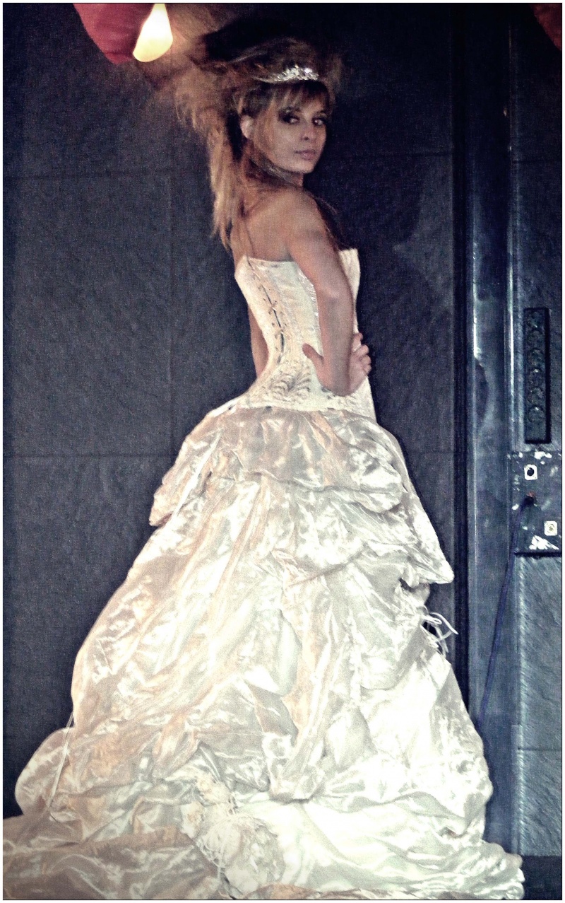 Female model photo shoot of Marta Pereira in Bridal Fashion Show - Designer Nuno Vidigal