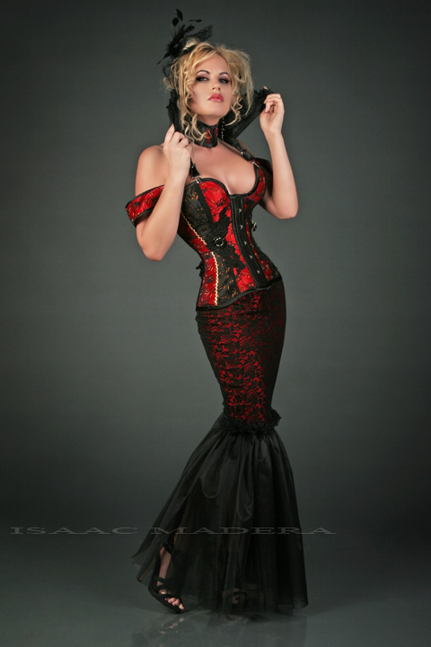 Female model photo shoot of Charlie Kristine by Isaac Madera in Hoss International Corsets, LA, hair styled by Jason Becker