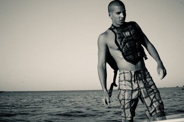 Male model photo shoot of bradenj in lake-wakeboarding