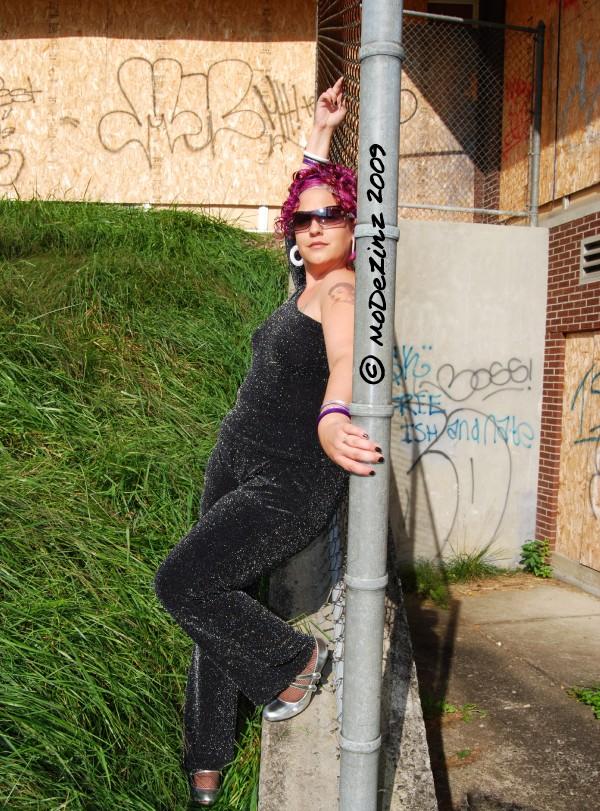Female model photo shoot of Dee Leguire by MoDeZinz Photography in Abandoned school yard shoot
