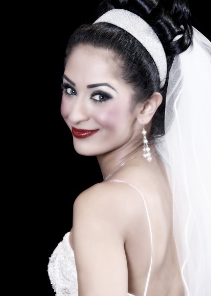 Female model photo shoot of Tousif T Makeup Artist