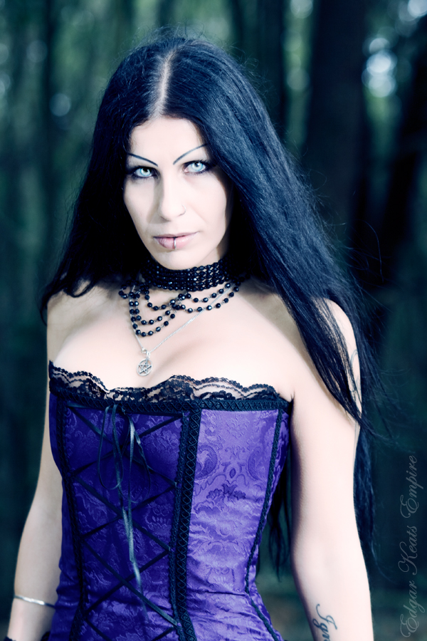 Female model photo shoot of Ignis_Soul by Tania Carvalho and 6x9 Studio in enchanted forest