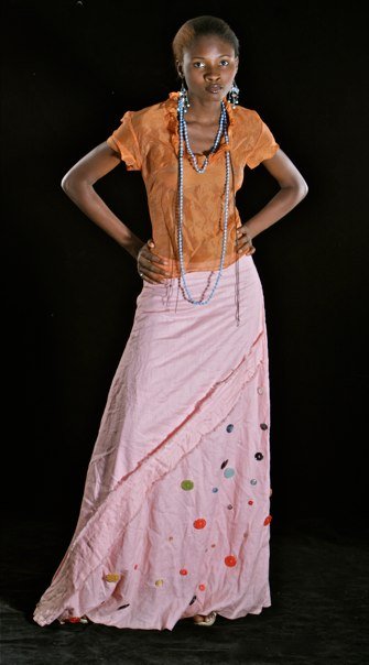 Female model photo shoot of Zuliat by ray tyson in Dazzle studios, Opebi