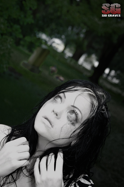 Female model photo shoot of ms doll face by Sid Graves in cemetery in stpetersburg fl