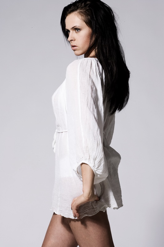 Female model photo shoot of Karo Raw in jeff hui's studio