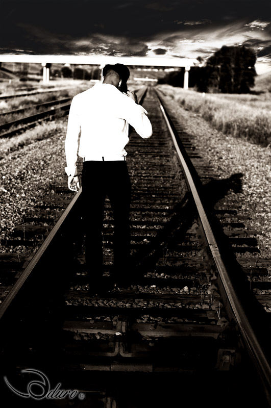 Male model photo shoot of Taylor Duecain in Train yard