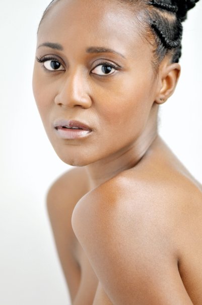 Female model photo shoot of Desola A by Lovelace Studio in Chicago, IL, makeup by Jill Alise