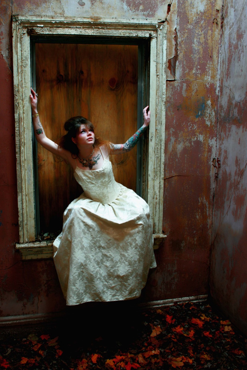 Female model photo shoot of Kate Wall Imagery in Mostly burned down house. Undisclosed.