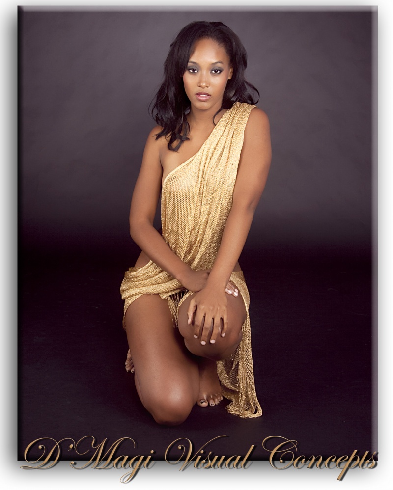 Female model photo shoot of Ebony Burton by D Magi Visual Concepts in Los Angeles, CA, makeup by Keith Beck