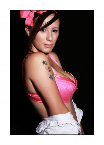 Female model photo shoot of vodoo tattoo