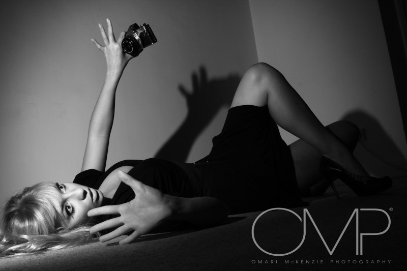 Male model photo shoot of omari mckenzie