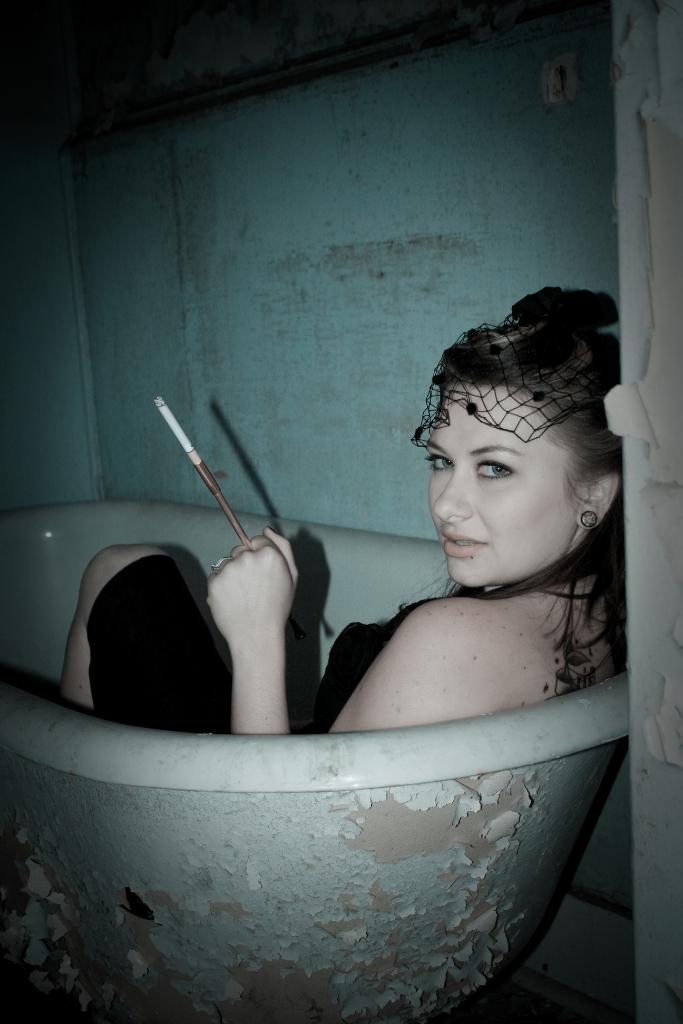 Female model photo shoot of Holley Hayworth by jsaiv_photography in Abandoned Hospital